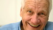 Cheerful old man laughing