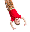 kid boy upside down isolated on white