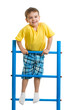 Happy kid boy on top of gymnastics ladder