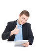 Smiling businessman with tablet computer showing thumb up