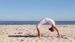 Woman doing crab yoga pose