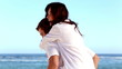 Couple joking and messing together on holiday