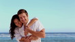 Romantic couple smiling at the camera