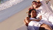 Attractive couple sleeping together in hammock