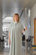 Female patient holding a drip stand while walking 