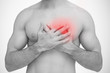Man touching chest pain