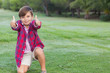 Cute boy giving thumbs up