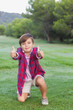 Portrait of boy giving thumbs uo