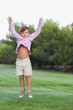 Cut boy jumping in the park