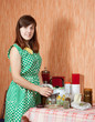 Woman brews herbs