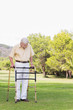 Elderly man using a zimmer frame to walk