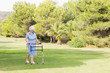 Elderly woman walking with a zimmer frame