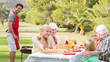 Happy family having a barbeque