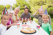 Family having birthday party in the park