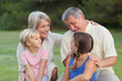 Grandparents chatting with grandchildren