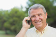 Grey haired man on the phone