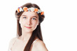 Portrait of a beautiful girl in a wreath
