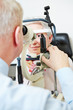 Photo: Ophthalmologist using slit lamp Ophthalmologist using slit lamp