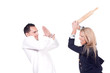Angry woman hitting her partner in a fight