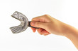 Woman hand sign with lower trays isolate on white background