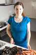  housewife with raw seafood