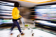 shopping at the supermarket,motion blur