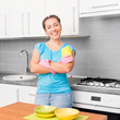 woman cleans the kitchen