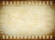 old grunge film strip with wooden background and texture