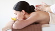 happy woman relaxing in spa salon
