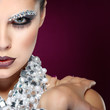 Foto: sexual beautiful girl with strasses on face, on a violet sexual beautiful girl with strasses on face, on a violet