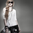 beautiful girl is in fashion style on  grey  background
