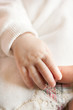 Baby and mother hands