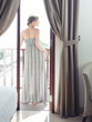Pretty woman on a balcony