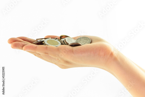 Photo: Coins on hand isolate Coins on hand isolate