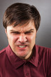 Closeup portrait of an angry man