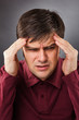 Young man having a headache