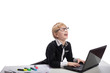 Laughing smart boy with laptop, white background