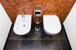 Toilet, bidet and paper