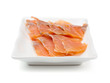 Red fish on white plate. Shallow dof.