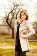 Photo: young woman in autumn garden young woman in autumn garden
