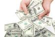 Hand holding a stack of money isolated on white background.