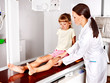 Child with doctor radiologist.