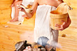 Friend relaxing in sauna.