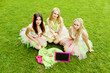 group of beautiful female friends smiling.  three pretty  girls