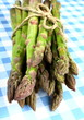 Green asparagus on white and blue checkered background