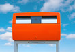Foto: Dutch public mailbox orange on sky background Netherlands Dutch public mailbox orange on sky background Netherlands