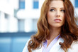 young brunette woman portrait in summer color