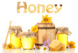 Honey in banks and barrel isolated on white
