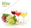 Photo: Glasses of wine and ripe grapes isolated on white Glasses of wine and ripe grapes isolated on white