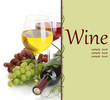 Bottle and glasses of wine and ripe grapes isolated on white